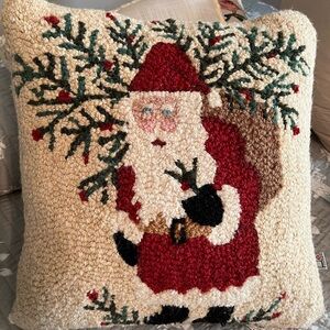 Chandler 4 Corners hooked pillow Santa Holding Tree 16” x 16”. By Laura Megroz